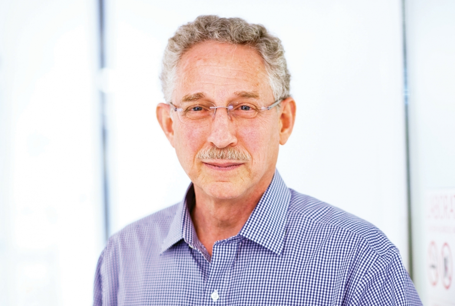 a man smiling for a portrait